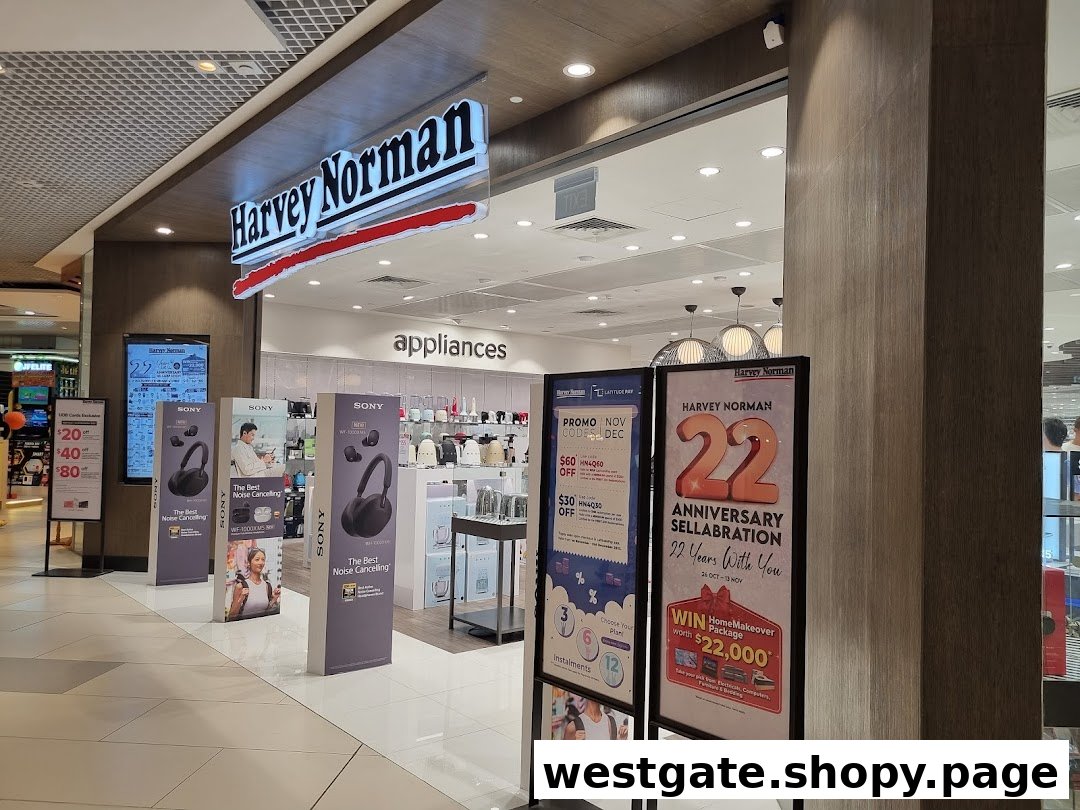 The entrance of Harvey Norman at Westgate Mall, featuring electronics and appliance displays with ongoing promotions.