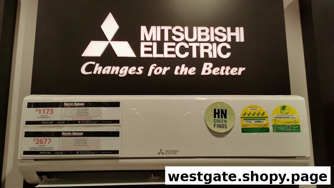 A Mitsubishi Electric air conditioner display with price tags and energy efficiency ratings at Harvey Norman.