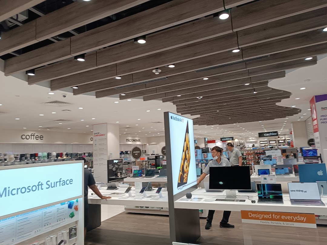 Interior view of Harvey Norman, showcasing a wide range of electronics, laptops, and home appliances.