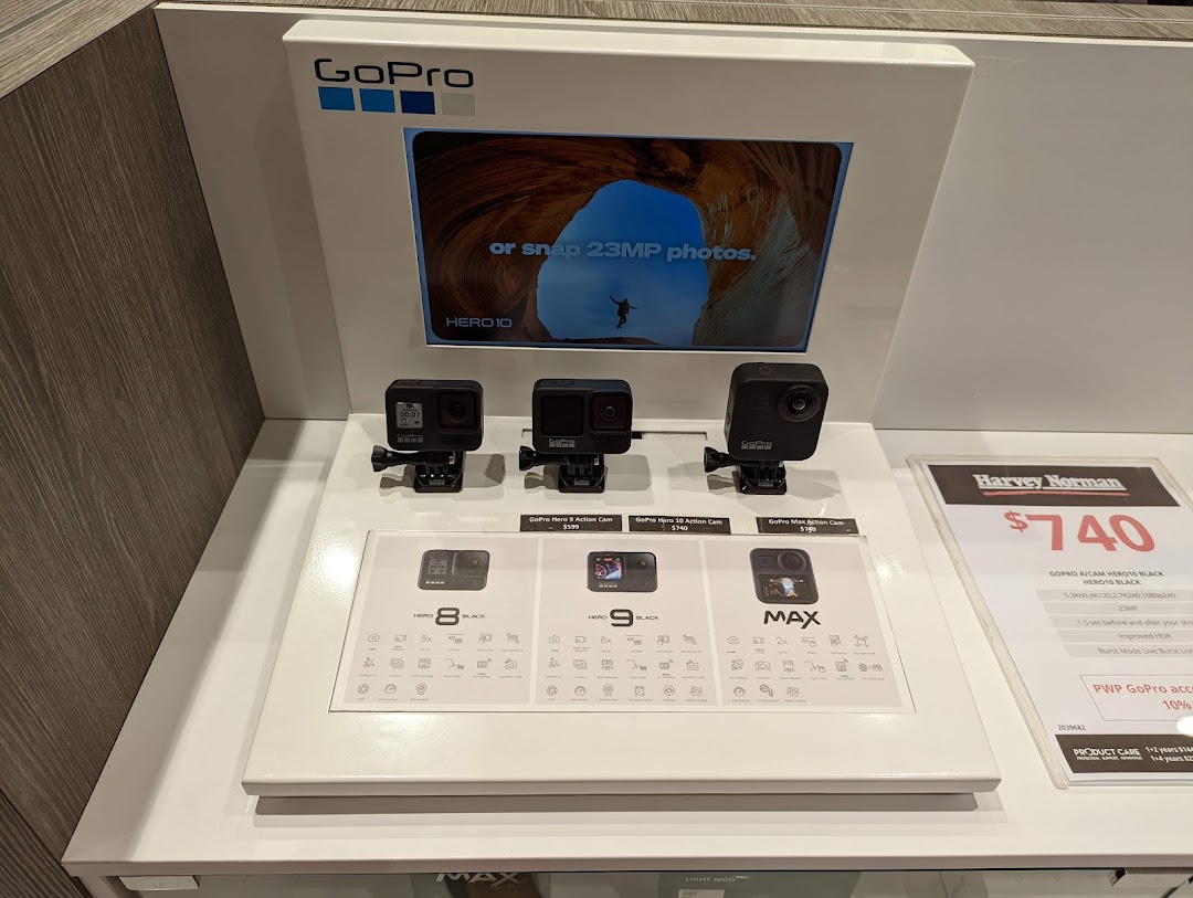 A display of GoPro action cameras, including Hero 8, Hero 9, Hero 10, and Max models, with pricing and features.