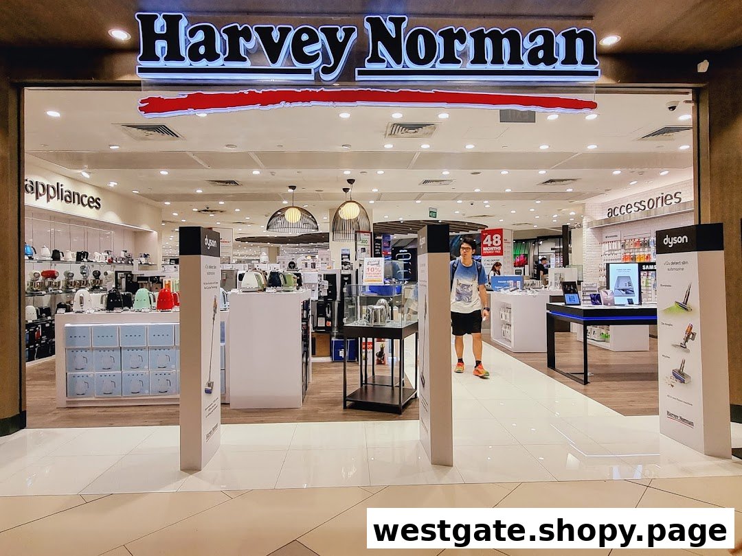 The brightly lit entrance of Harvey Norman, showcasing a wide array of home appliances and electronics.