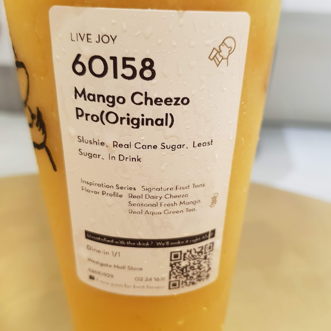 A close-up of HEYTEA's Mango Cheezo Pro drink with its detailed product label.