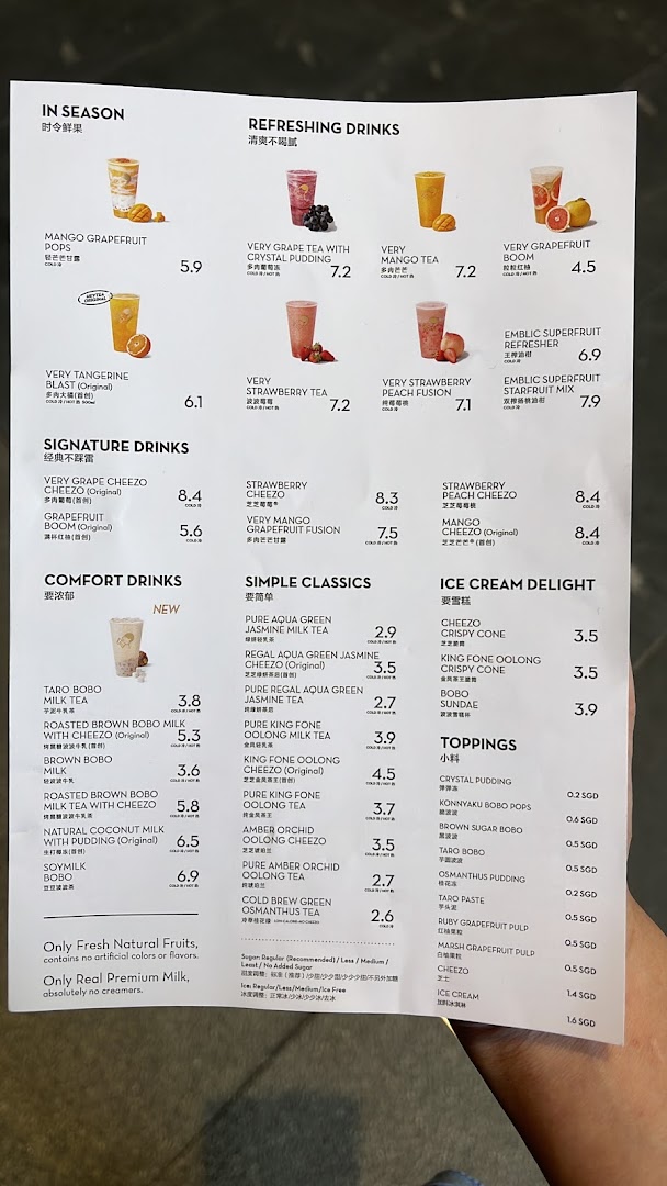 A comprehensive menu from HEYTEA, showcasing various fruit teas, milk teas, and ice cream delights.