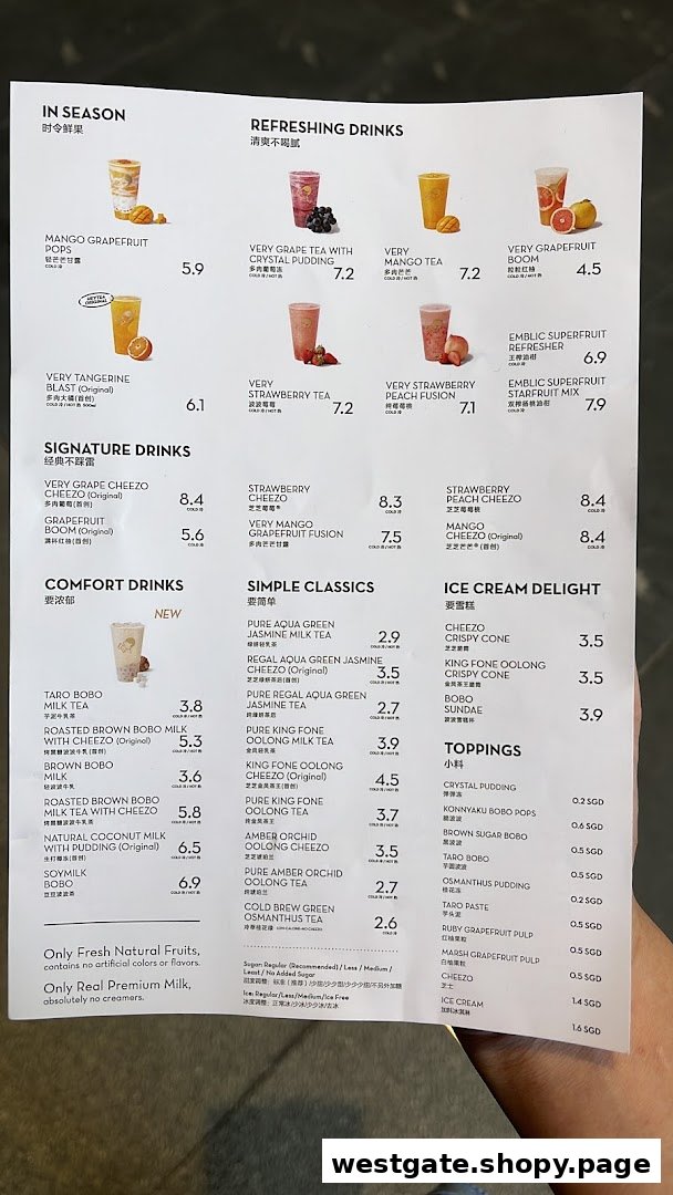 A comprehensive menu from HEYTEA, showcasing various fruit teas, milk teas, and ice cream delights.