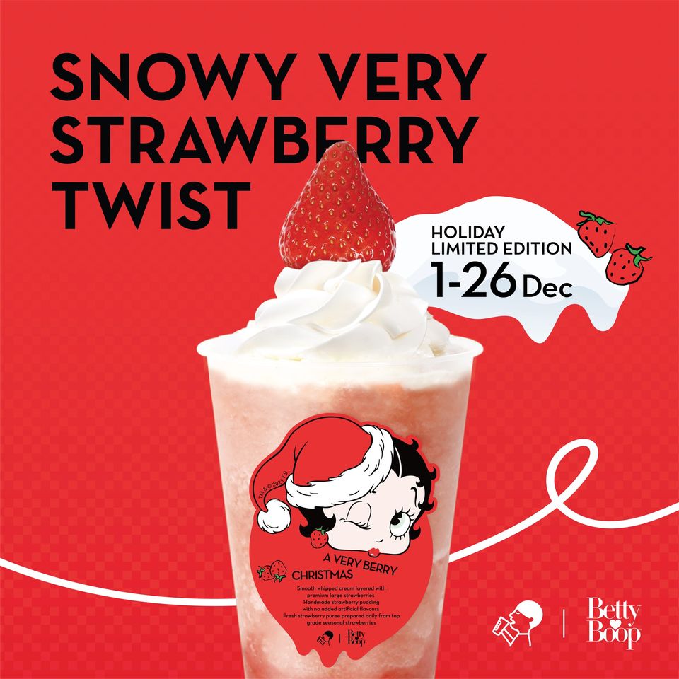 A holiday-themed strawberry drink with whipped cream and a Betty Boop label.