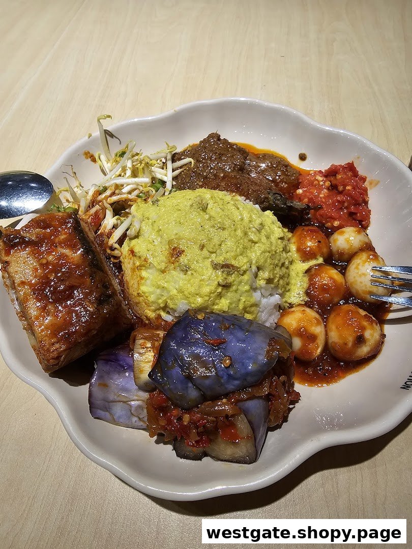 A vibrant plate of traditional Malay/Indonesian cuisine featuring rice, various curries, vegetables, and sambal.