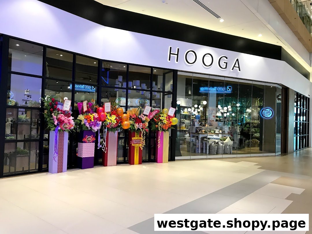 The HOOGA shop entrance at Westgate, adorned with vibrant grand opening flower arrangements.
