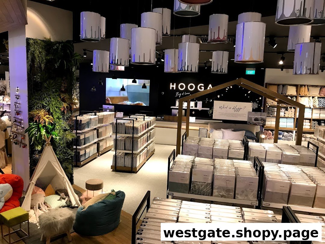 Interior view of HOOGA store showcasing home decor, bedding, and a cozy children's play area.