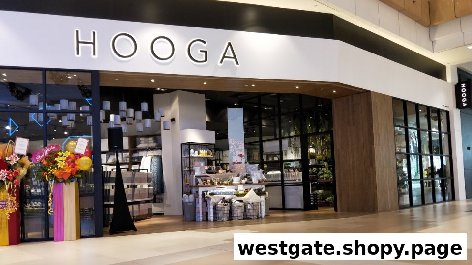 The inviting storefront of HOOGA Westgate, a home and living store, featuring its entrance and displays.