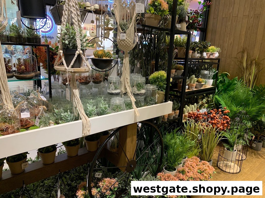 A vibrant display of artificial plants, succulents, terrariums, and home decor items at HOOGA Westgate.