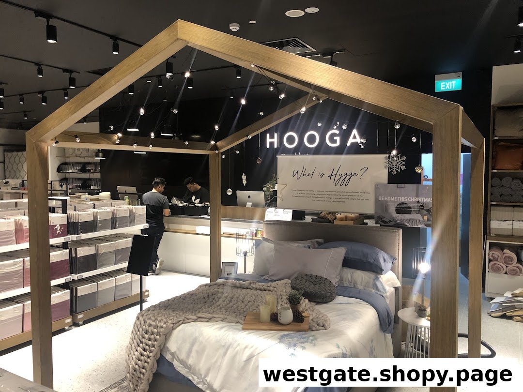 Interior view of HOOGA, showcasing a cozy bed display, cashier counter, and home decor items.