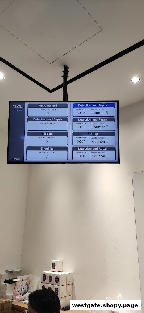 A digital queue management screen displaying service categories and current queue numbers inside a Huawei store.