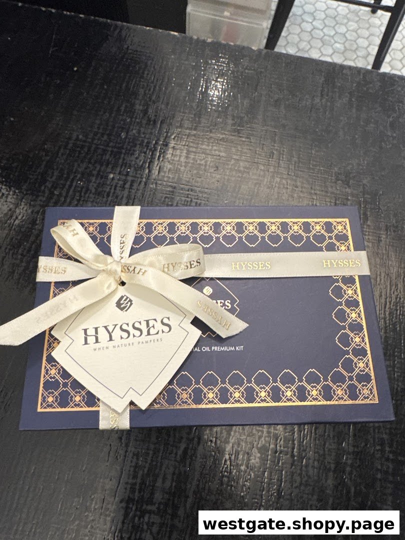 A beautifully packaged dark blue gift box from HYSSES, tied with a cream ribbon and tag.
