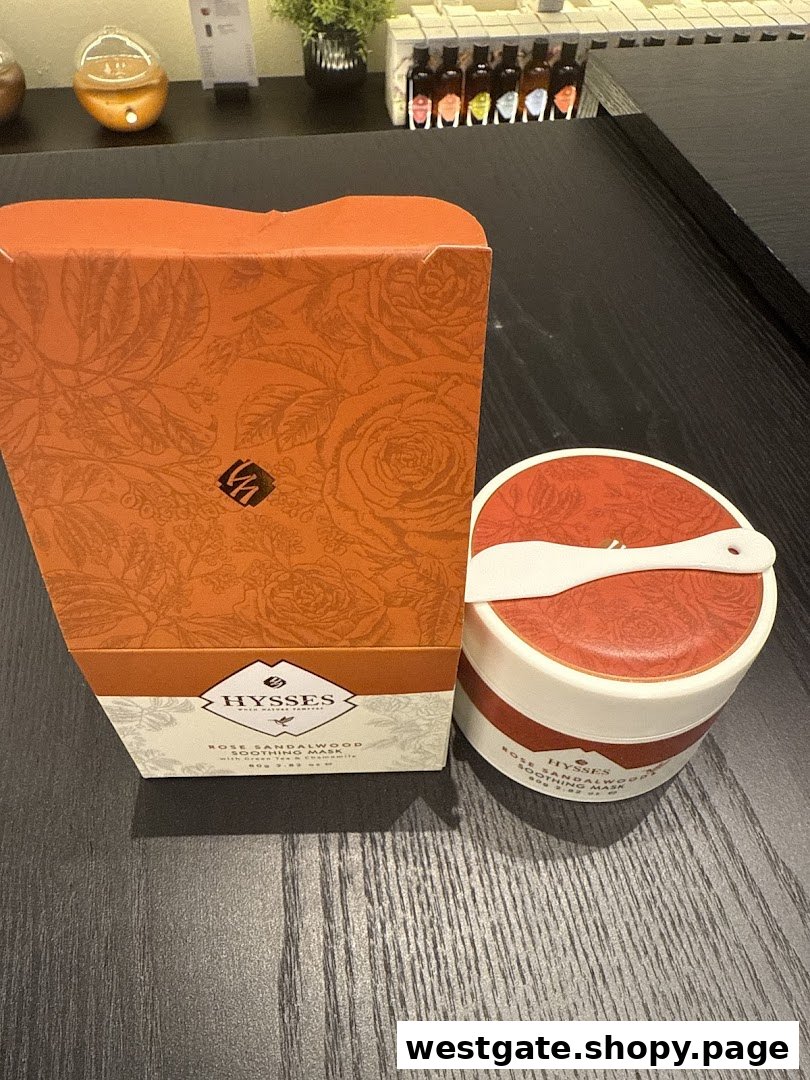 A HYSSES Rose Sandalwood Soothing Mask box and jar displayed on a dark surface.