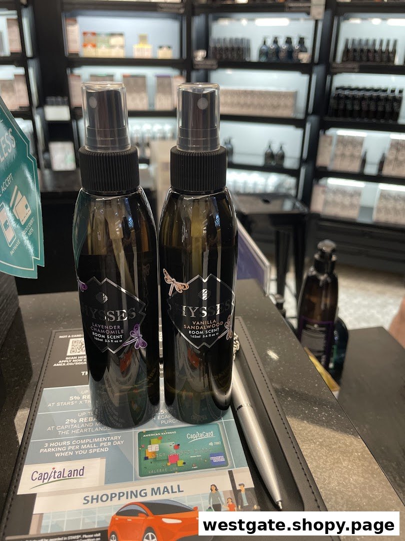 Two HYSSES room scent bottles on a counter, with shop interior and product shelves in the background.
