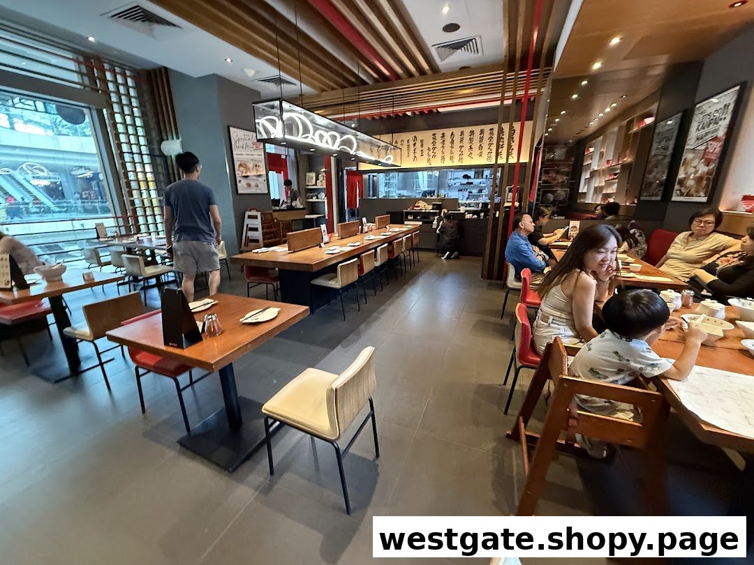 A vibrant interior shot of IPPUDO Westgate, featuring diners enjoying meals in a modern setting.