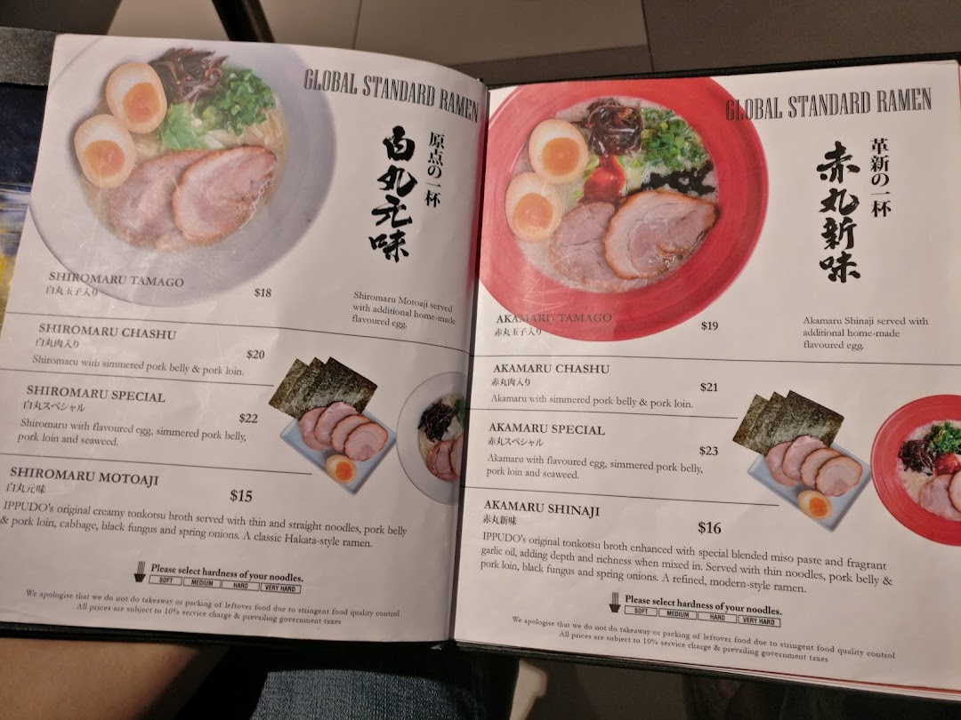 A detailed menu displaying various ramen dishes, including Shiromaru and Akamaru options with prices and descriptions.