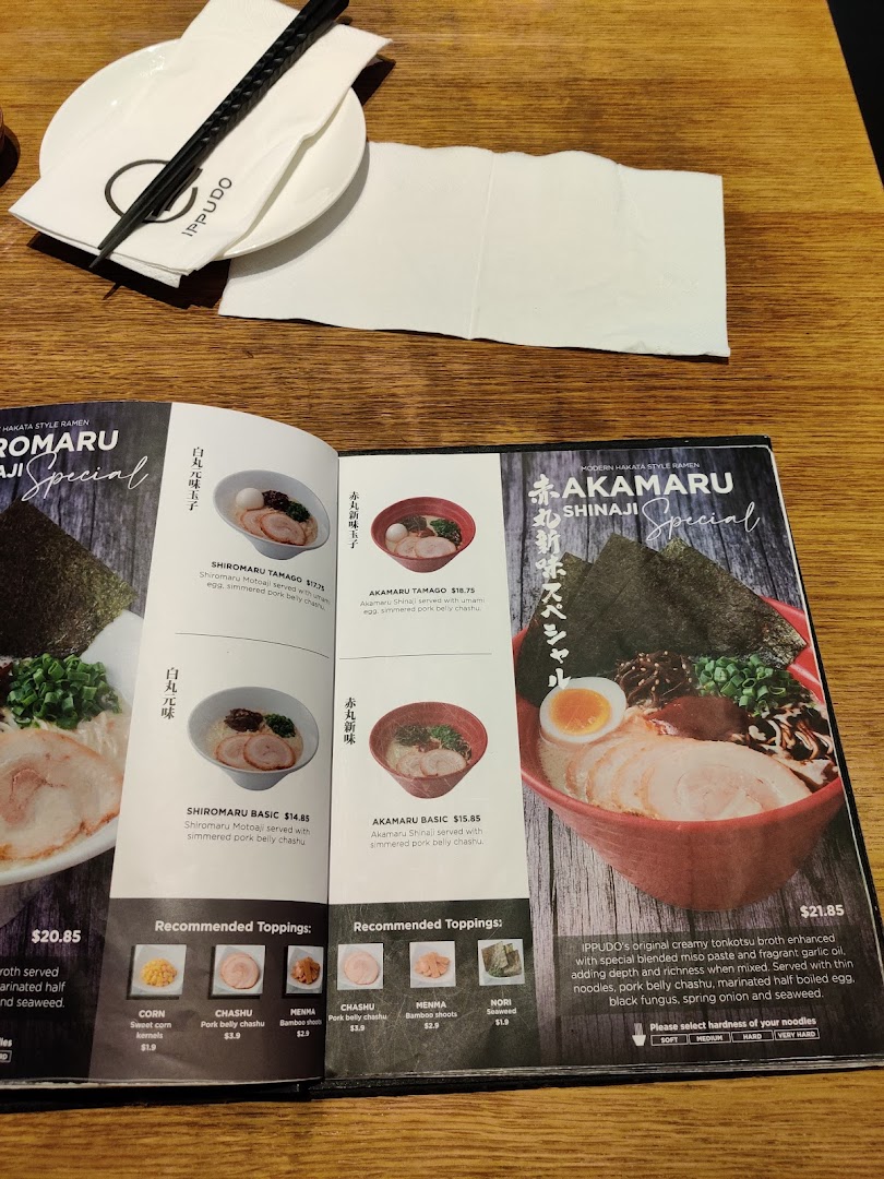 A detailed view of IPPUDO's ramen menu, showcasing various ramen dishes and toppings.