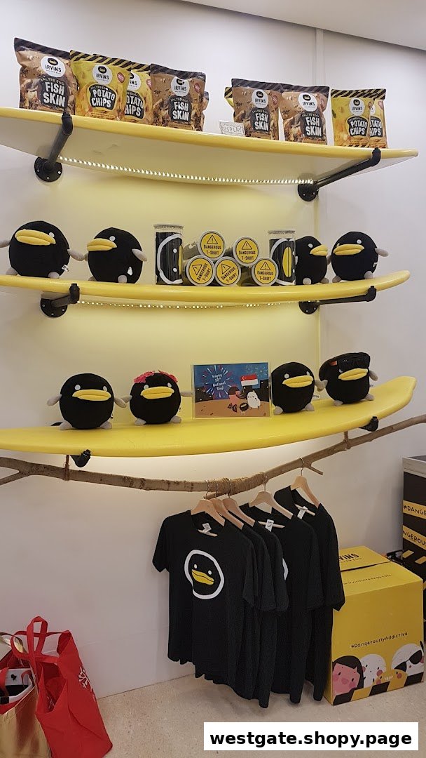 A vibrant display of Irvins salted egg snacks, merchandise, and adorable duck plush toys on surfboard-shaped shelves.