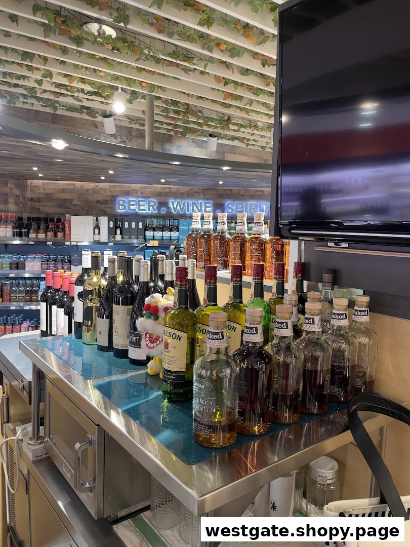 A vibrant display of various beer, wine, and spirit bottles on a counter inside Jays Bar.