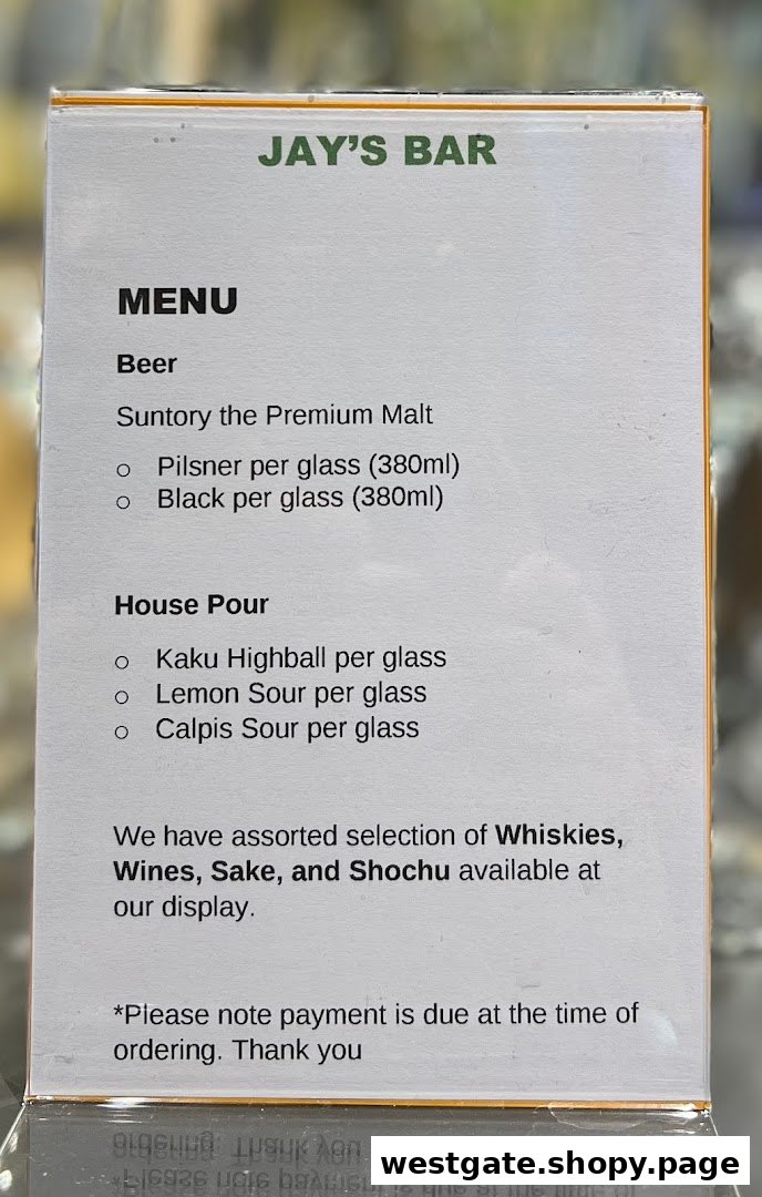 A menu board from Jay's Bar displaying beer and house pour selections.