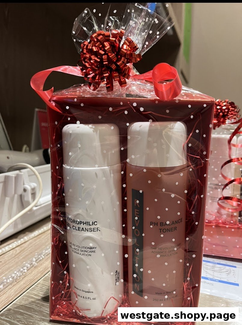 A red gift box containing two skincare products: a hydrophilic gel cleanser and a pH balance toner.