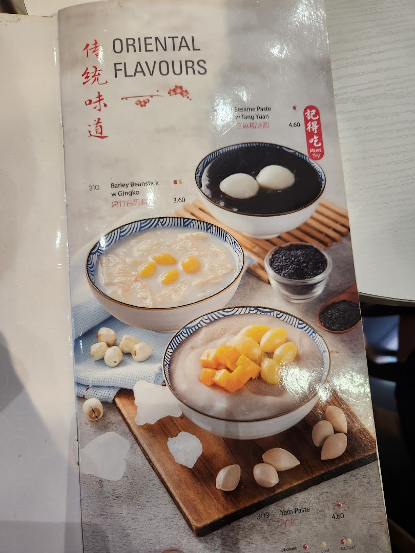 A menu page displaying traditional Oriental dessert options with images and prices.