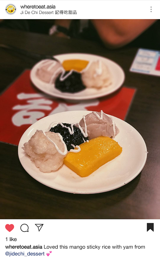 A vibrant dessert plate featuring mango, sticky rice, and other sweet treats from Ji De Chi Dessert.