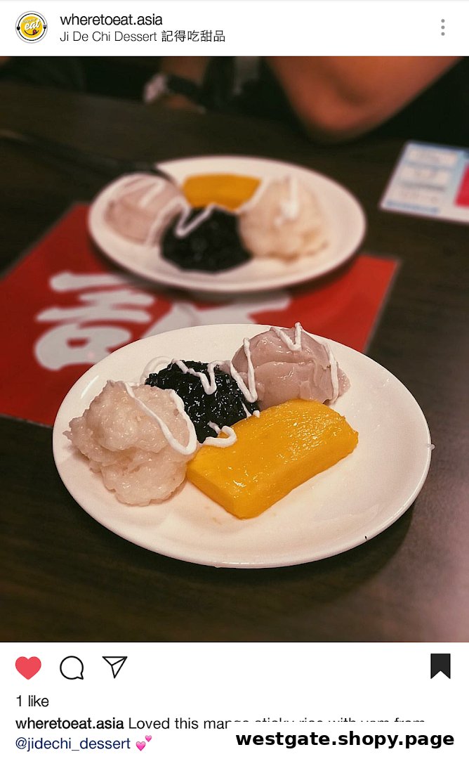 A vibrant dessert plate featuring mango, sticky rice, and other sweet treats from Ji De Chi Dessert.