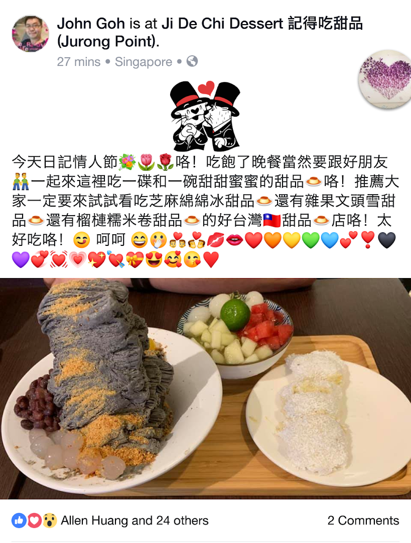 A unique black shaved ice dessert with red beans and lychee, a fruit bowl, and a white dessert on a wooden tray.