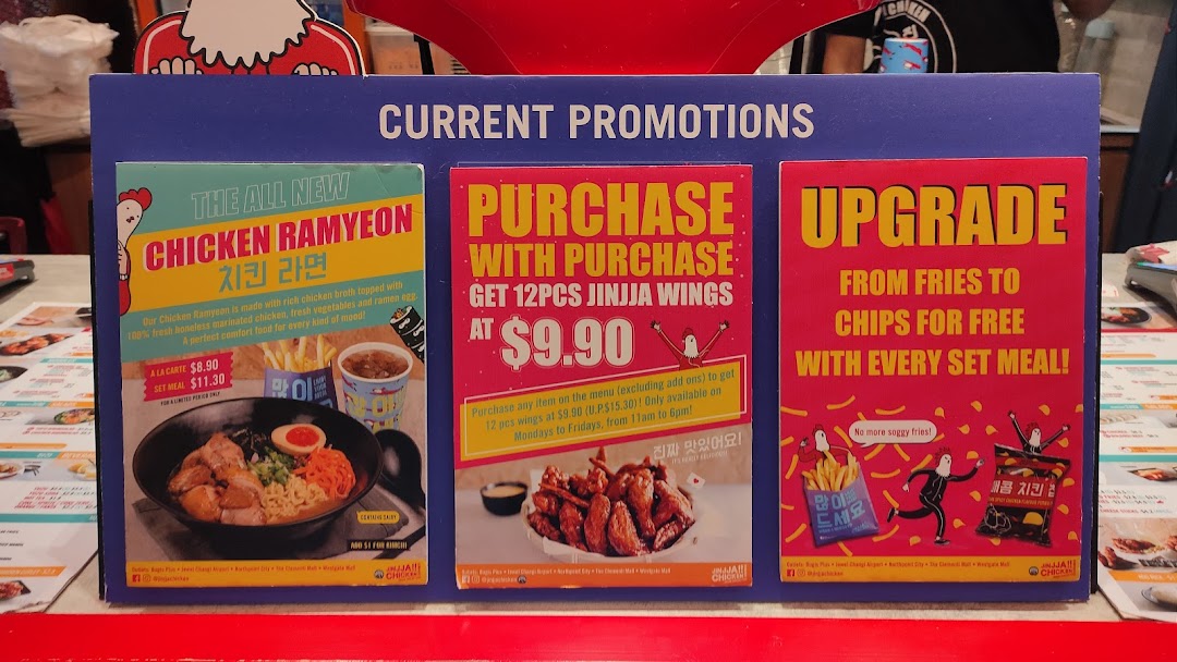 A display board showcasing current food promotions and special offers at JINJJA Chicken.