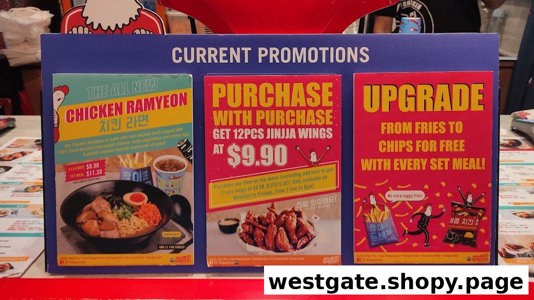 A display board showcasing current food promotions and special offers at JINJJA Chicken.