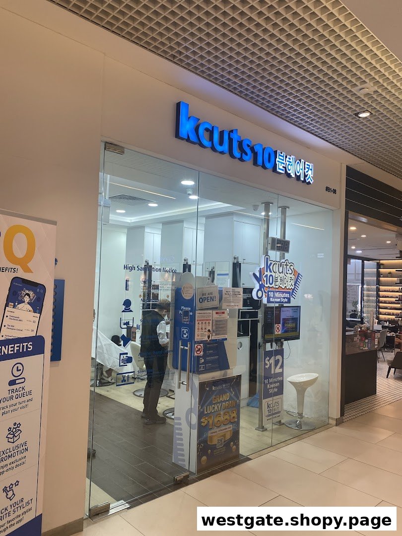 The storefront of kcuts, a hair salon offering quick Korean-style haircuts, with a customer inside.