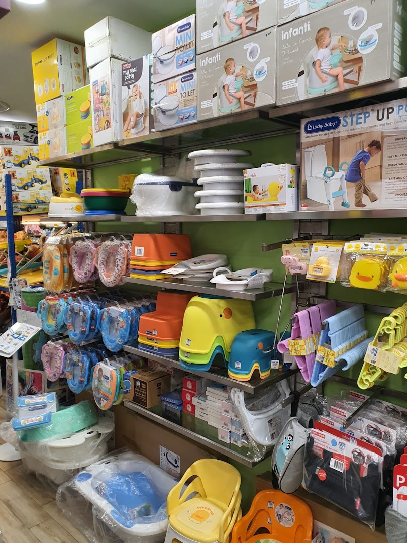 Shelves filled with various baby and toddler essentials, including potties, bath seats, and training aids.