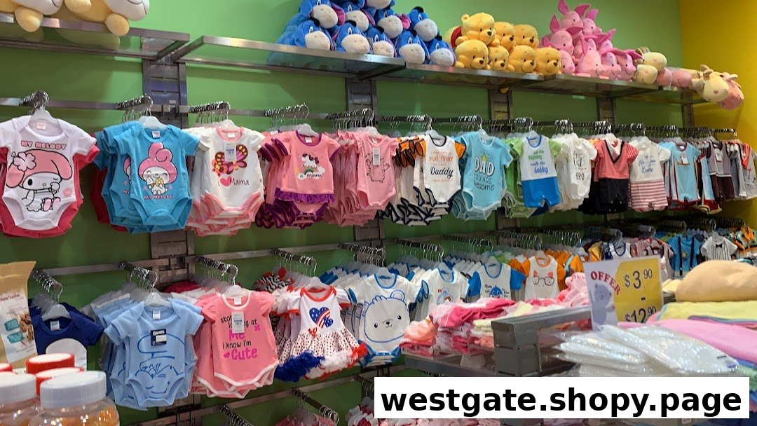 An aisle in Kiddy Palace displaying a wide selection of colorful baby rompers and plush toys.