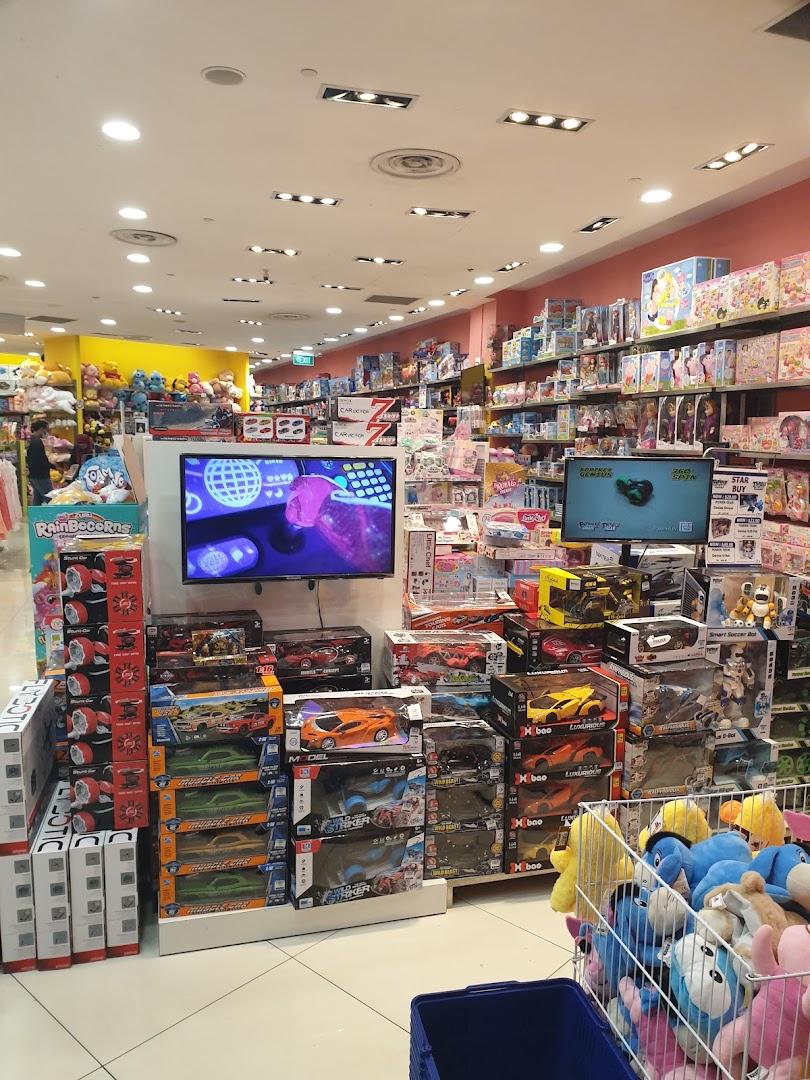 Interior view of Kiddy Palace, showcasing a wide array of toys, plushies, and interactive displays.