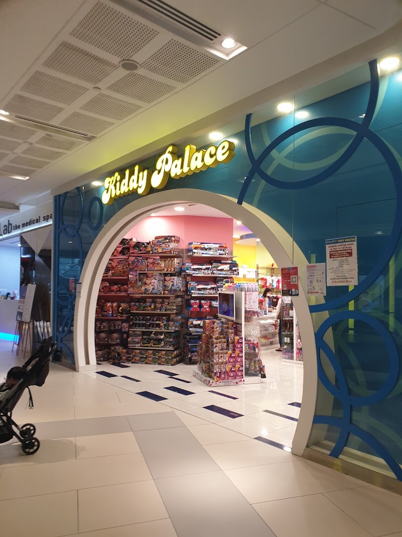 The vibrant entrance of Kiddy Palace, a children's toy and apparel store.