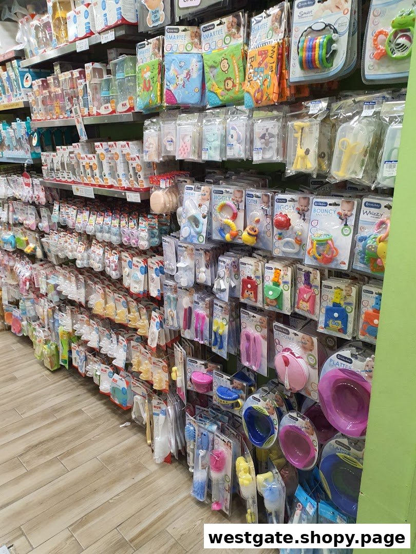 Shelves filled with a wide variety of baby bottles, feeding accessories, and infant toys.