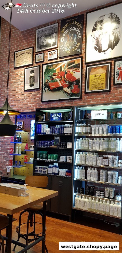 Interior view of Kiehl's store, showcasing skincare and haircare products on shelves, with vintage decor and a wooden table.