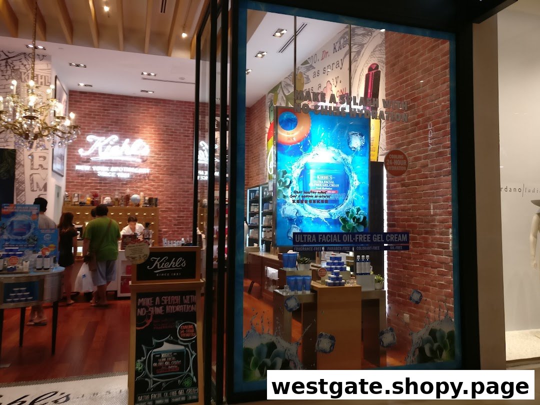 Kiehl's Westgate shop entrance with a vibrant window display featuring skincare products and a welcoming interior.