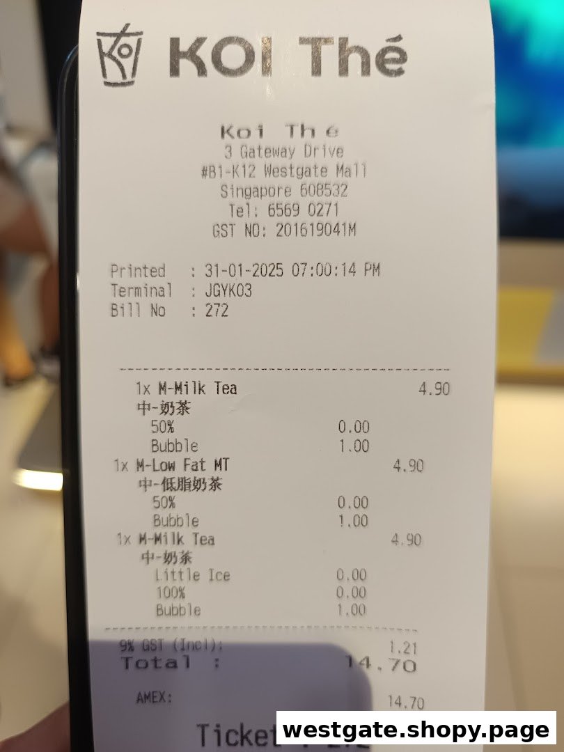 A detailed receipt from KOI Thé Westgate Mall showing multiple bubble tea purchases and total cost.