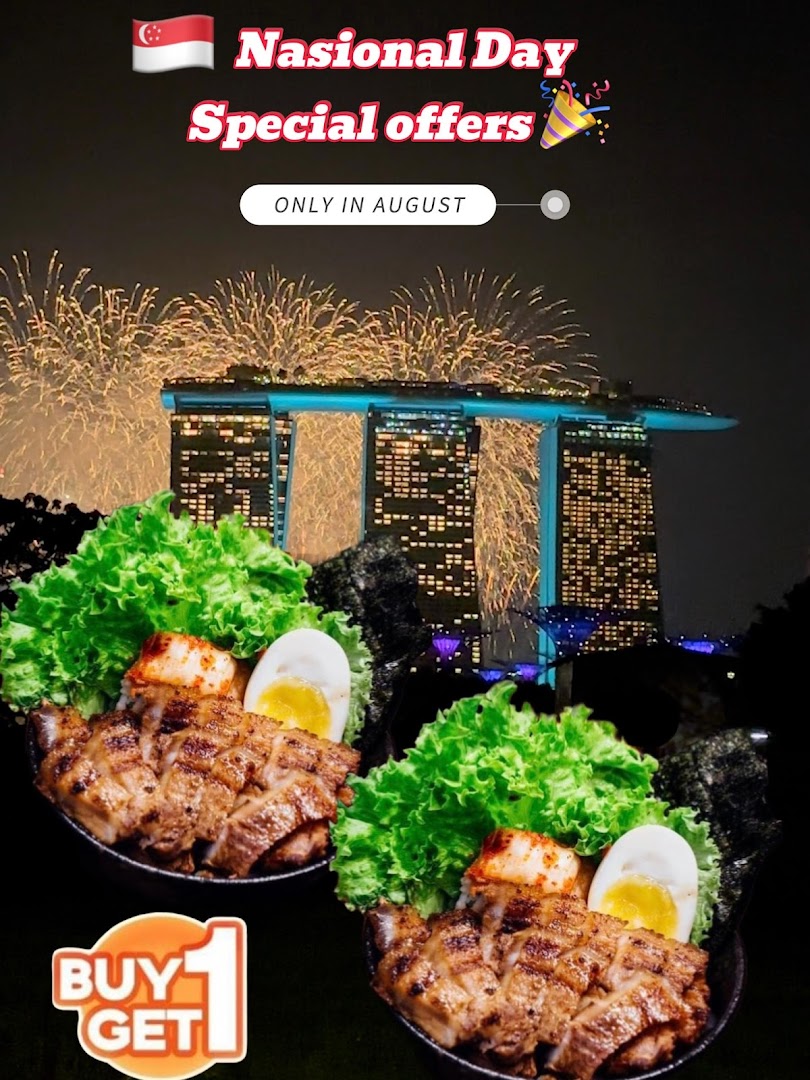 Two Japanese grilled meat bowls with sides, advertised with a National Day Buy 1 Get 1 offer.