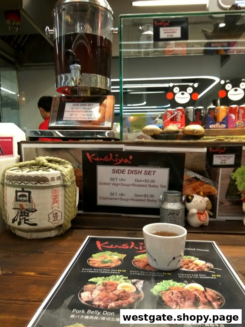 A close-up of Kushiya Japanese Grill House's menu, featuring various donburi and side dish options.