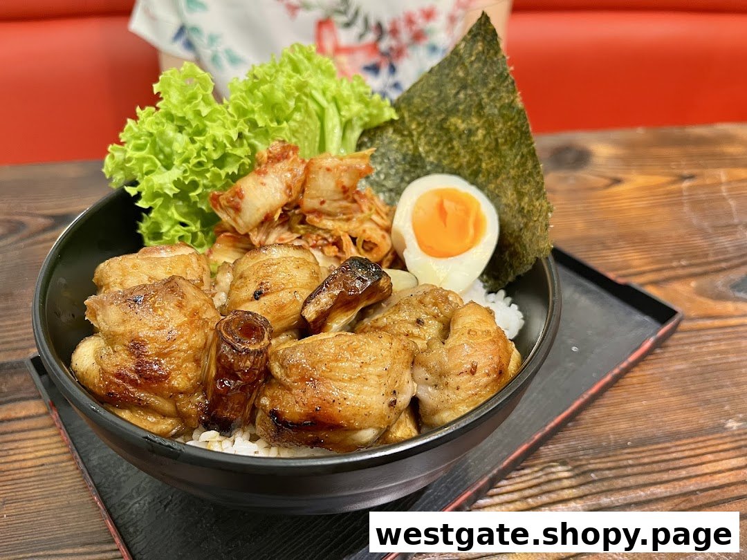 A delicious Japanese donburi bowl featuring grilled chicken, kimchi, a soft-boiled egg, and fresh lettuce.