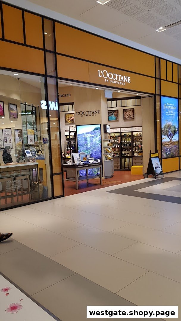 The L'OCCITANE shop front, showcasing its inviting entrance and signature branding within a mall.