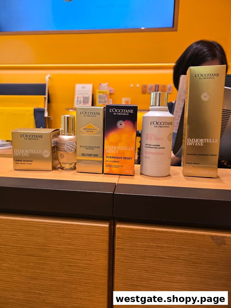 A selection of L'Occitane skincare products, including Immortelle Divine and Overnight Reset lines, displayed on a counter.