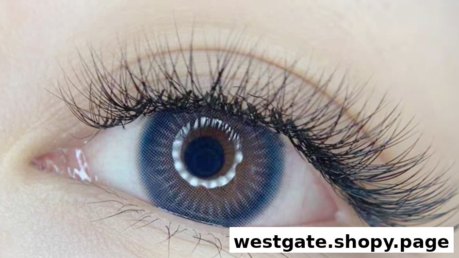Close-up of an eye showcasing voluminous lash extensions and a colored contact lens.