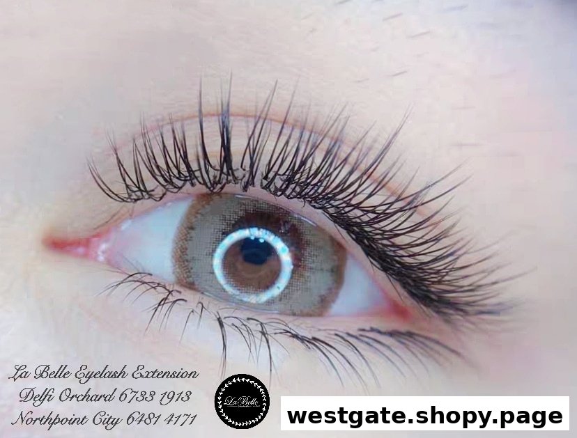 Close-up of an eye with extended eyelashes, showcasing La Belle's aesthetic services.