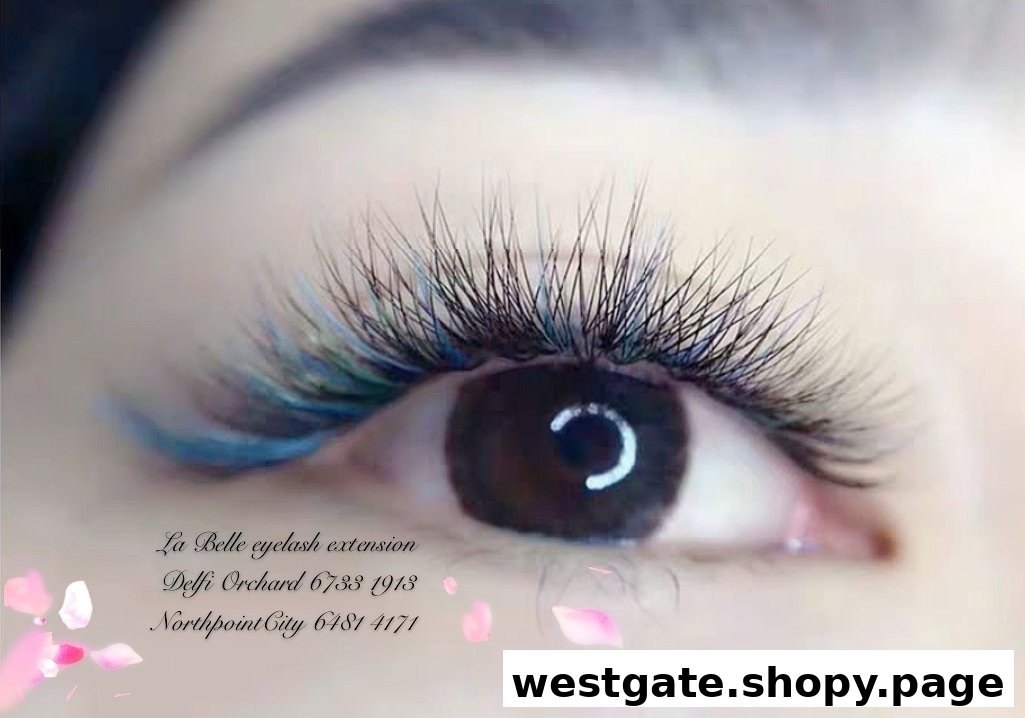 Close-up of an eye showcasing vibrant blue and black eyelash extensions.
