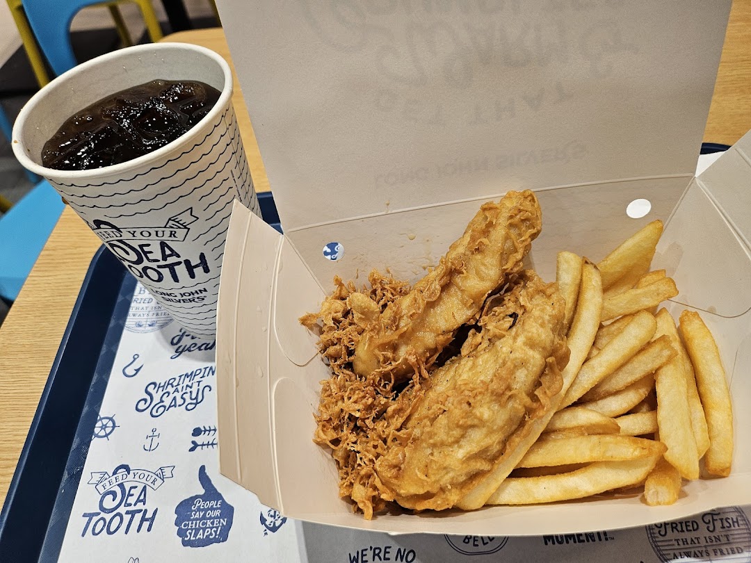 A close-up of Long John Silver's classic fish and chips meal with a drink on a tray.